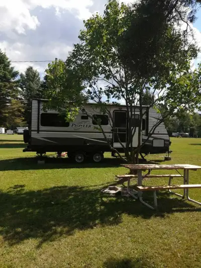 2017 heartland pioneer, rd 210, 26 foot, no slides, one bedroom with privacy curtain, stored at KOA...