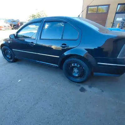 2005 VW Jetta GLS Mk4. 4 cyl automatic. Good body, solid underneath. Tinted windows, aftermarket led...