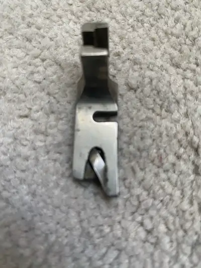 This sewing machine foot is used, but still in good working condition. It may be just what you need...