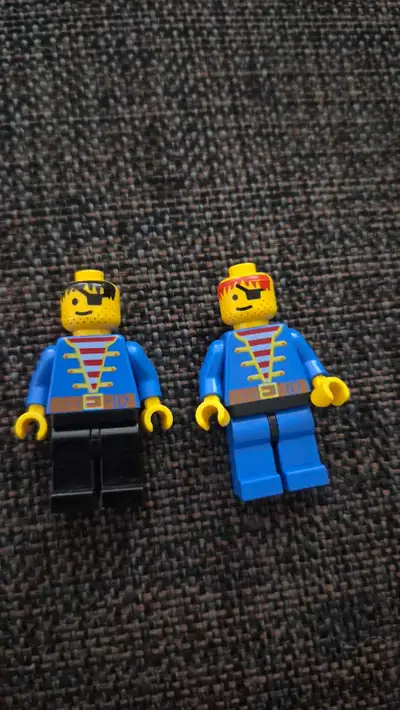 Add these two classic LEGO pirate minifigures to your collection. These are pre-owned items and show...