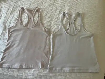 Lululemon crop tanks size 8, fit like 6, View more