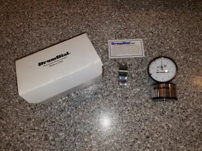 Here's a DrumDial Precision Drum Tuner, it's still working fine and comes as pictured. This was orig...
