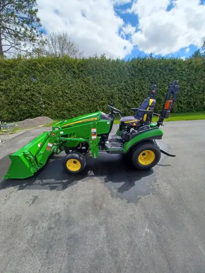 John Deere 1025r,25 HP hydrostatic 4 WD,with loader h120,60 inches mid deck auto connect,47 inches f...