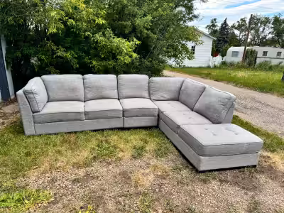 Grey sectional in wonderful condition, super comfy. Could use a slight clean-from pet friendly non-s...