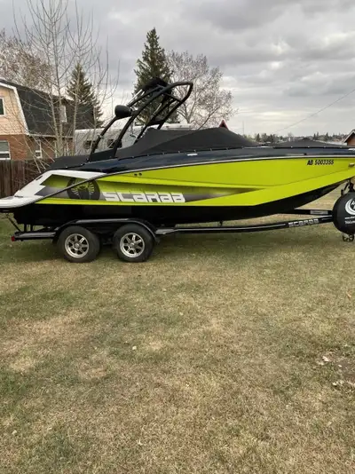 Selling my 2016 Scarab 215 HO Impulse Wake edition boat that's in super clean condition and has low...