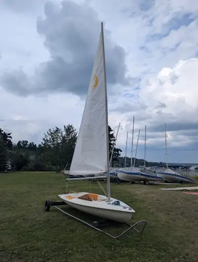 Well loved and ready to sail. Rigging is all in great shape, sail has been patched. Rebuilt rudder....