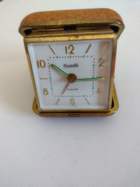 Vintage wind up travel alarm clock