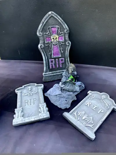 Halloween tombstones and  ghostly widow, View more
