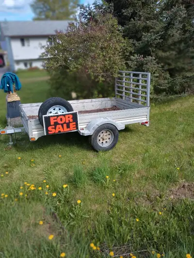 8 ft long, 4'10" wide aluminum cargo trailer.