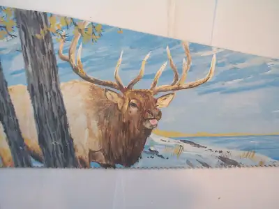 Something unique for your cottage or den. An old saw (measuring 29 inches x 6 inches) with a bull El...