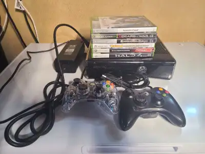 Xbox 360 with 2 controllers amd 6 games $75, View more