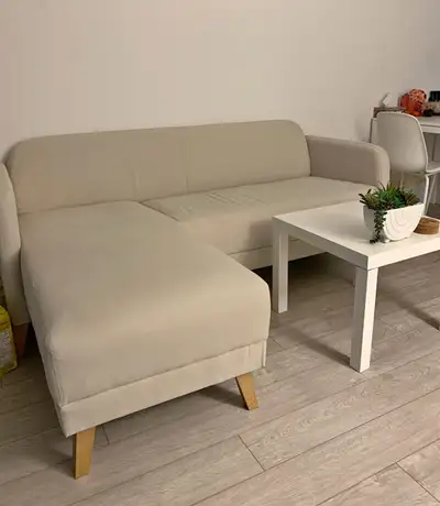 This stylish sectional sofa is in good condition, perfect for adding comfort and elegance to any liv...