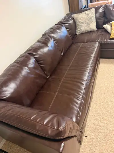 Each section is about 7 feet long by 3 feet deep. Lots of life left in this couch. I had the top cus...