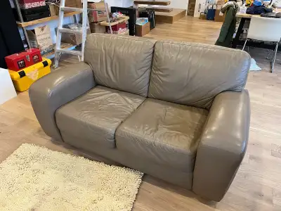 Leather love seat/sofa, View more