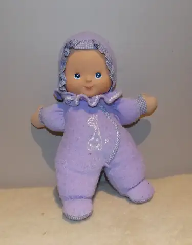 MY 1st BABY DOLL. This purple doll is completely soft and cuddly for a small child. It is 12 inches...