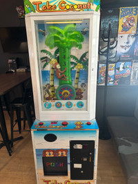 Take coconut arcade prize game works great