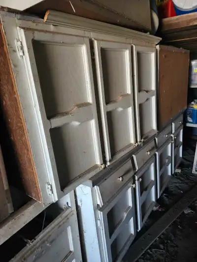 Have approximately 16 ft of kitchen cupboards top section and bottom section