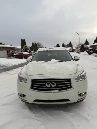 Selling my 2013 Infiniti JX35 with around 330,000km, luxury 7-seater —powered by a 3.5L V6. It featu...