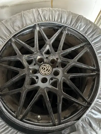 Excellent tires and rims 2 at 255/55R18 and 2 at 235/60R18. On black RSSW rims. Came off a Porsche M...