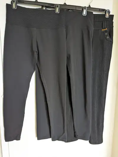 2 pair Tuff Athletics pants - both are 86% nylon and 14% spandex. * First pair has kind of a ruched...