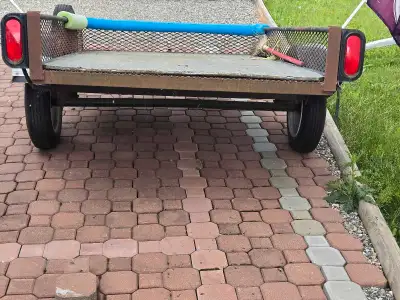 Small tilt-up trailer, 48"W x 71"L, new 12" wheels with bearing buddies and ball receiversuitable fo...