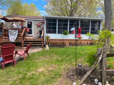 Move in ready this 3 Bedroom cottager with Sunspace Room. Comes with appliances dishes 3 T.V'S 36" B...