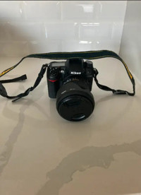 Excellent Nikon SLR D7000 with external, extra lens, camera bag