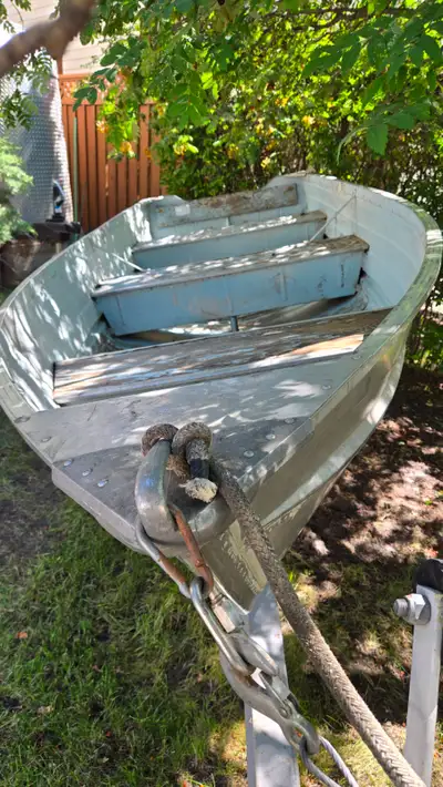 12 foot aluminum fishing boat manufactured by Sears. Boat is in great shape no dents or damage and h...
