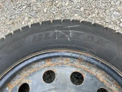 Set of 4 Bridgestone Blizzak DM-V2 tires Used for 1 Season (Roughly 8,000km) Size: 235/60R18 On exis...