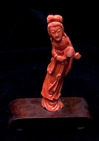 Exceptional Carved Momo Coral Figure of a Guanyin ""Kwan Yin""