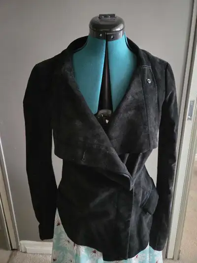 Only worn a few times. Can be dressed in different styles. Size S but can probably fit a medium. Cas...