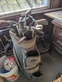 Set of golf clubs plus a umbrella  with bag