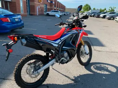 This is a brand new bike. Never driven. Comes with a cargo carrier, windshield and dash speedo.
