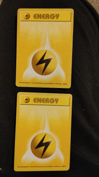 Two 1999 Pokemon Base Set SHADOWLESS lightning Energy 100/102