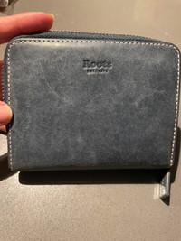 Roots tribe wallet and tan wallet 