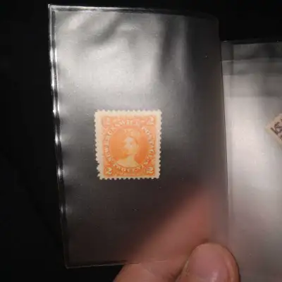 This is a used New Brunswick 2 cent stamp, a piece of postal history! This vintage stamp features a...