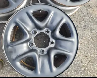 BARGIN PRICE. 18 inch rims and Hubcaps to fit Toyota. Were removed from 2012 Tundra.
