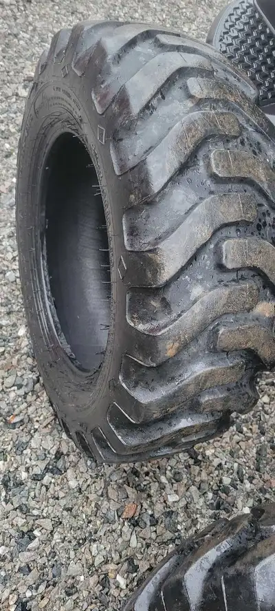 Selling two industrial tires in very good condition no plugs lots of tread left. Size 27x8.50x15