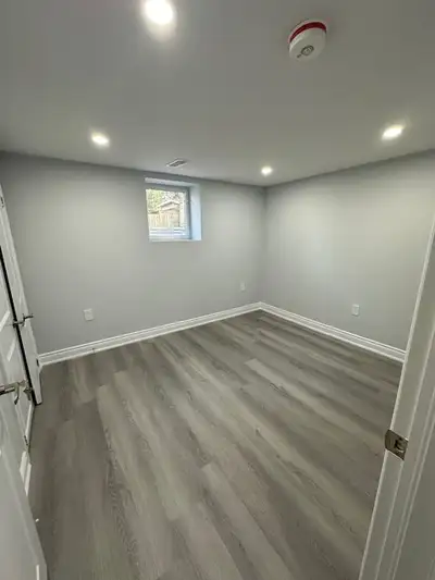 Bedroom available in walk out basement near Mclaughlin & Queen