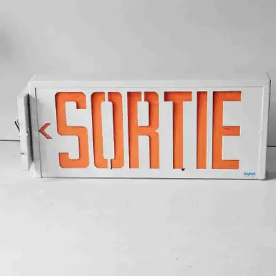 SORTIE SIGN 18" W x 7.5" L ( Inches ) Made by Beghelli. Great Shape.