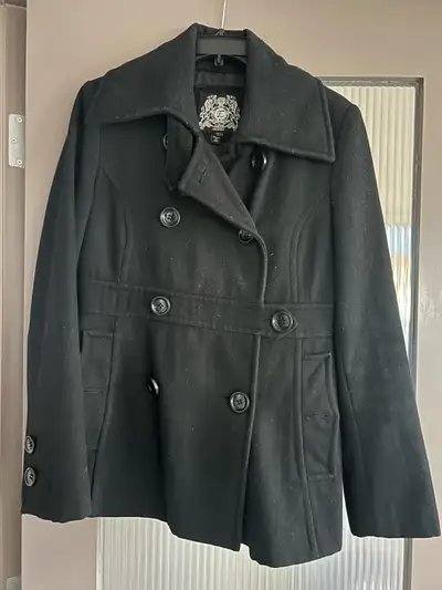 This is a stylish black Esprit pea coat, wool bind, perfect for adding a touch of sophistication to...