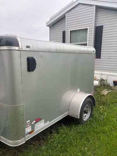 This Mint condition 2025 CargoMate enclosed trailer features an 8-foot length with a sturdy single a...