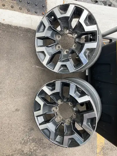 These rims were replaced by tire installer because the paint on them were scratched. Rims came off a...