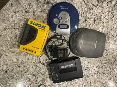 Vintage portable audio player lot. Includes: • Sony Sports Walkman WM-AF54 • Sony Walkman WM-F2015 •...
