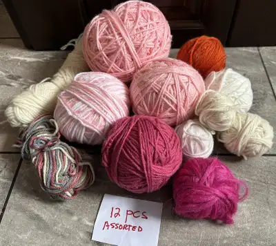 This is a collection of 12 pieces of assorted yarn. The yarn is used, but still has lots of life. Th...