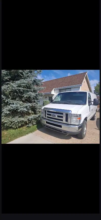 2012 Ford E250 cargo van for sale. Professional shop rebuilt engine (runs great, can get detail rece...