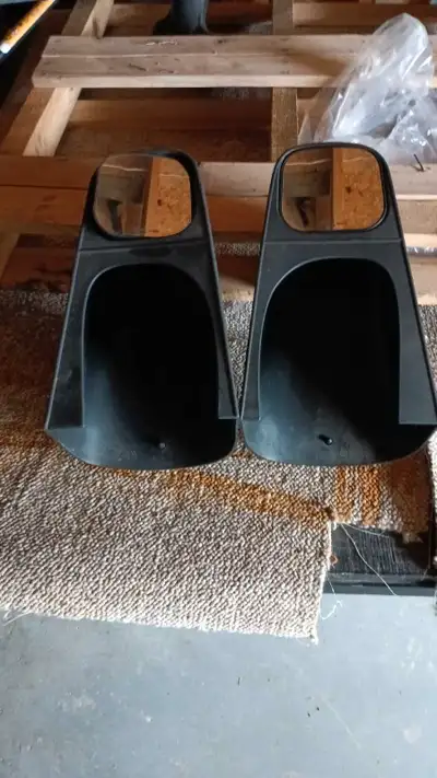 These are used side mirrors designed for a Ford F150, offering a practical replacement for damaged o...