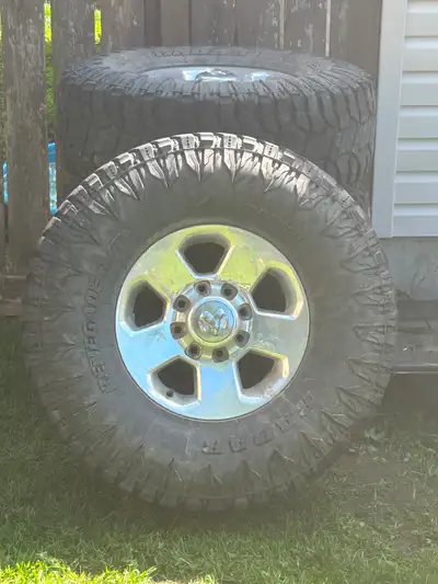 17 inch Rims from 2015 ram 2500 with 37 by 12.5 tires on them all tires still have functioning air p...
