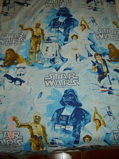 These are original 1977 Star Wars twin flat sheet and twin fitted sheet made by Esmond Canada. The t...
