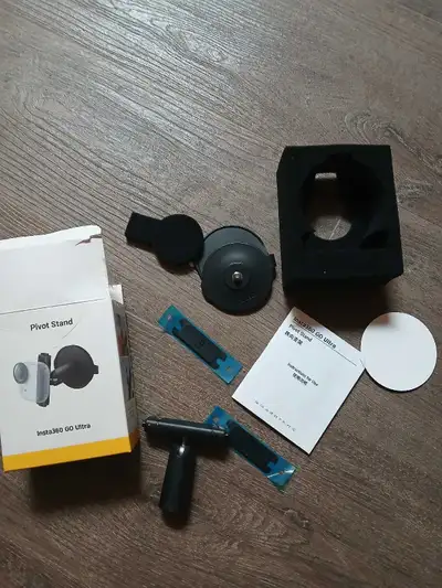 The Insta360 GO Ultra Pivot Stand, designed to offer versatile mounting options for your action came...